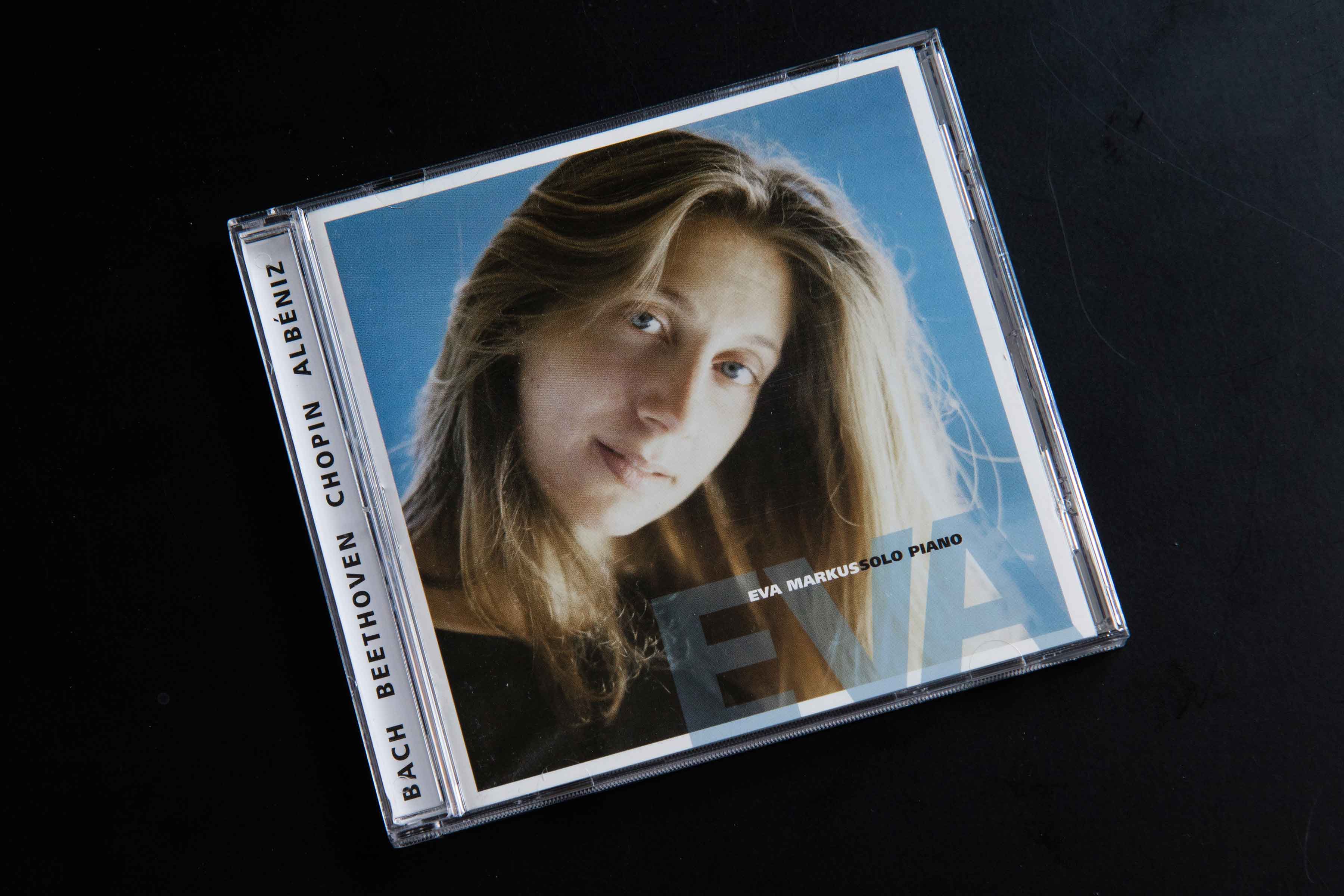 Eva composing at the piano