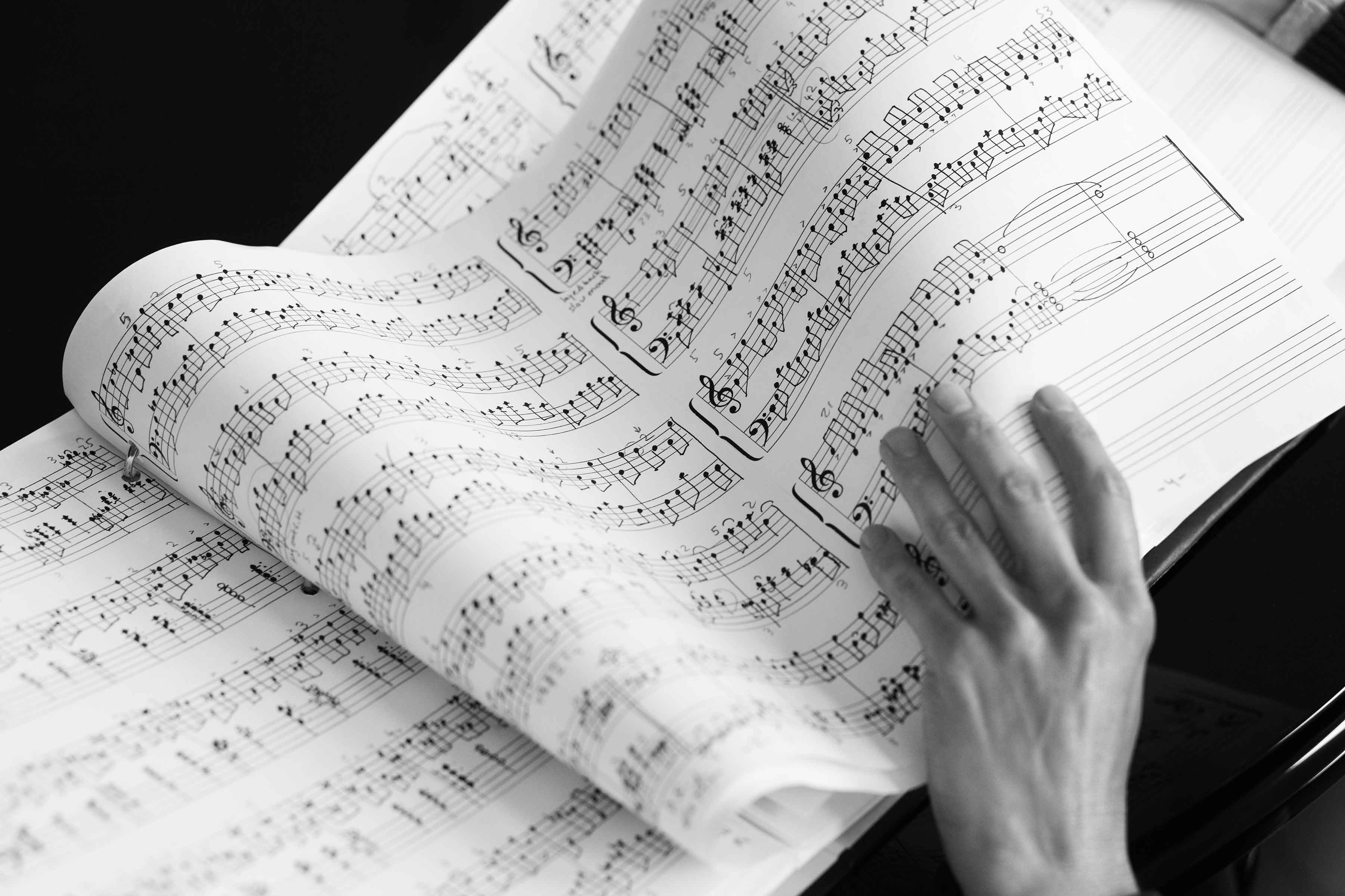 Eva turning a page from her composition