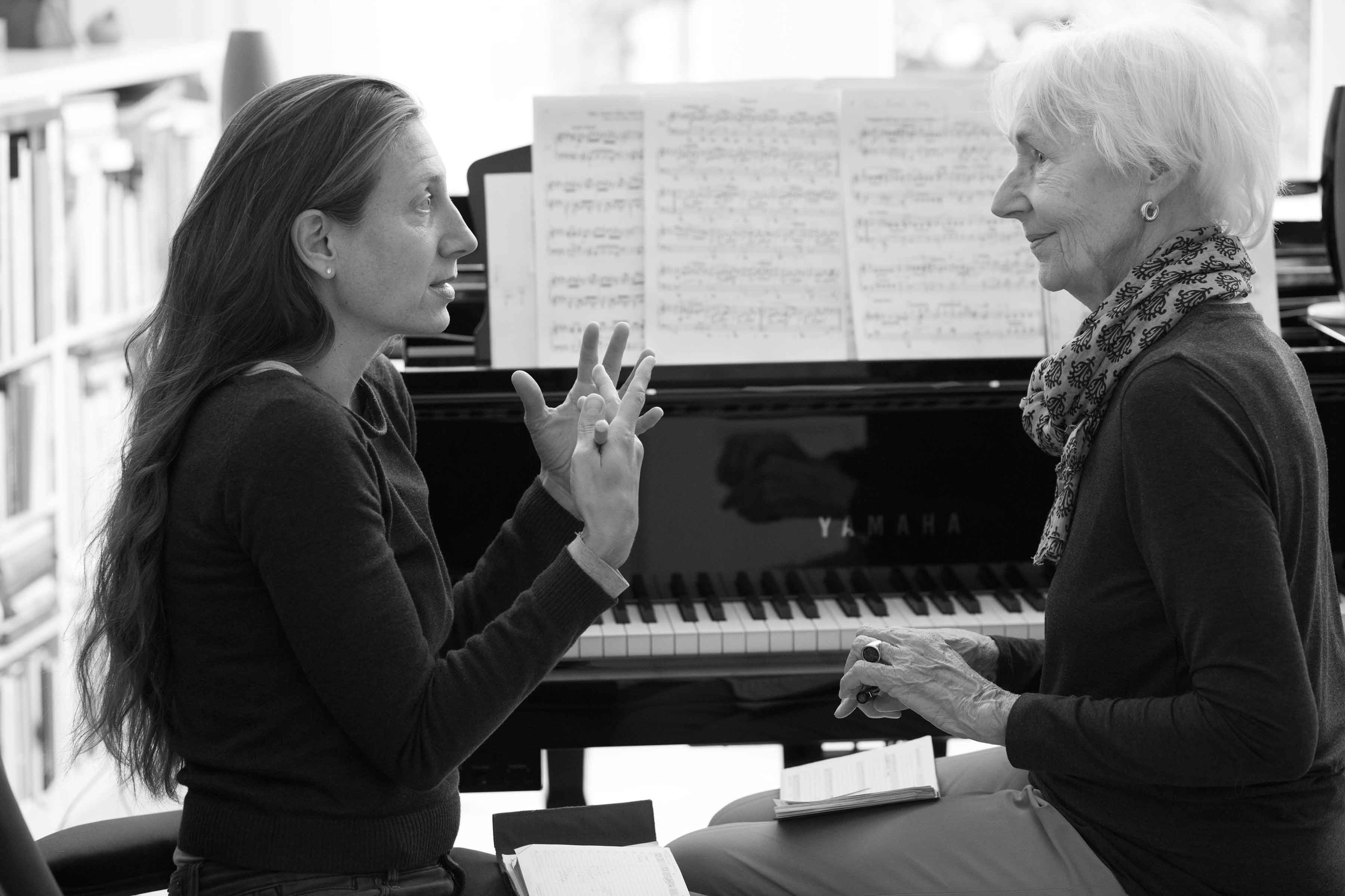 Eva teaching a senior student